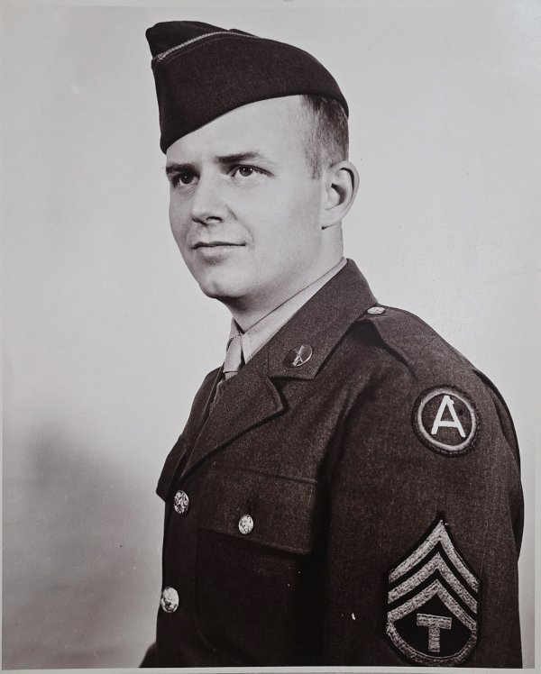 Formal studio portrait, Third Army &ldquo;A&rdquo; patch and Technical Sergeant chevrons.